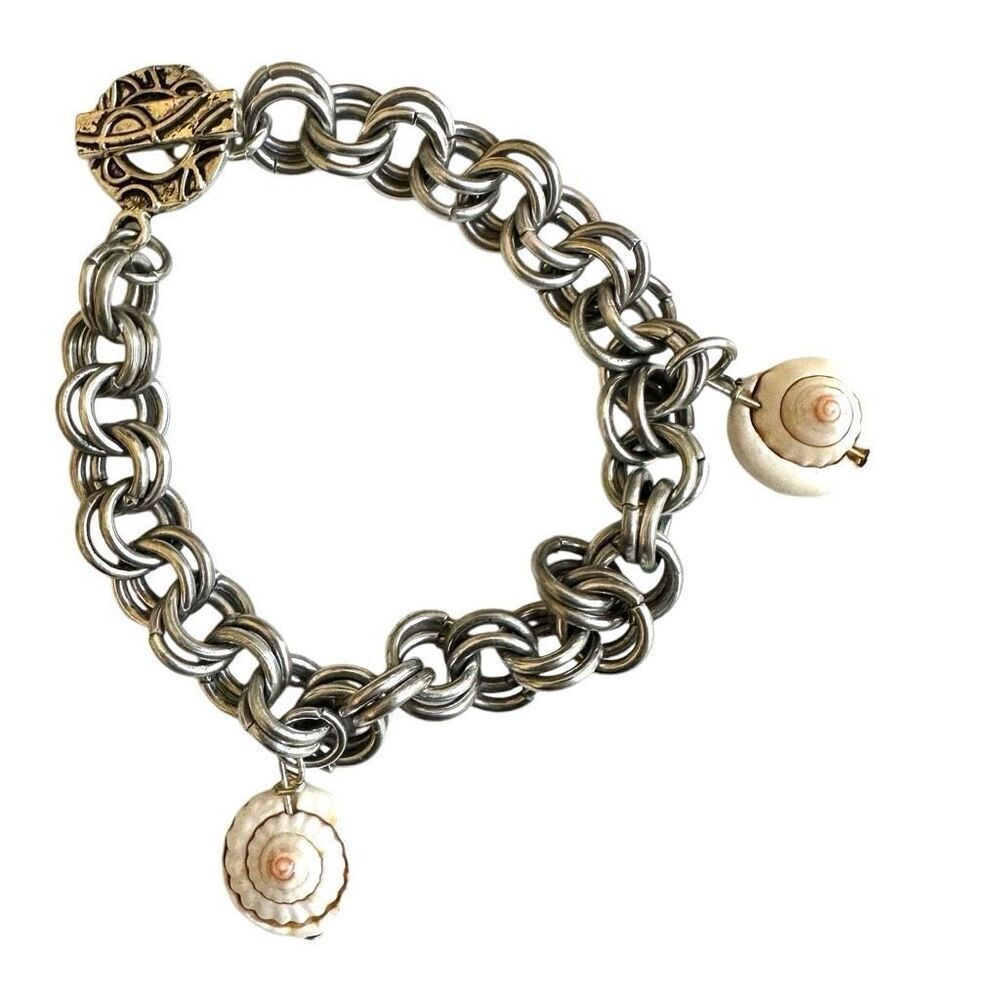 Silver tone shell charm bracelet